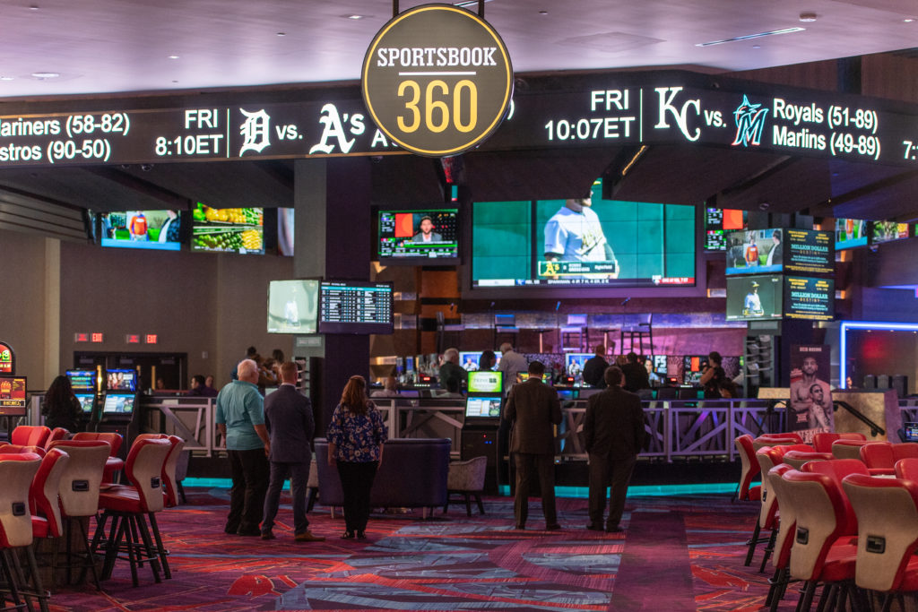 The Grand Opening Celebration Of The New 360 Sportsbook At Resorts World Casino With Professional Athletes Santana Moss, Larry Johnson And John Starks.
